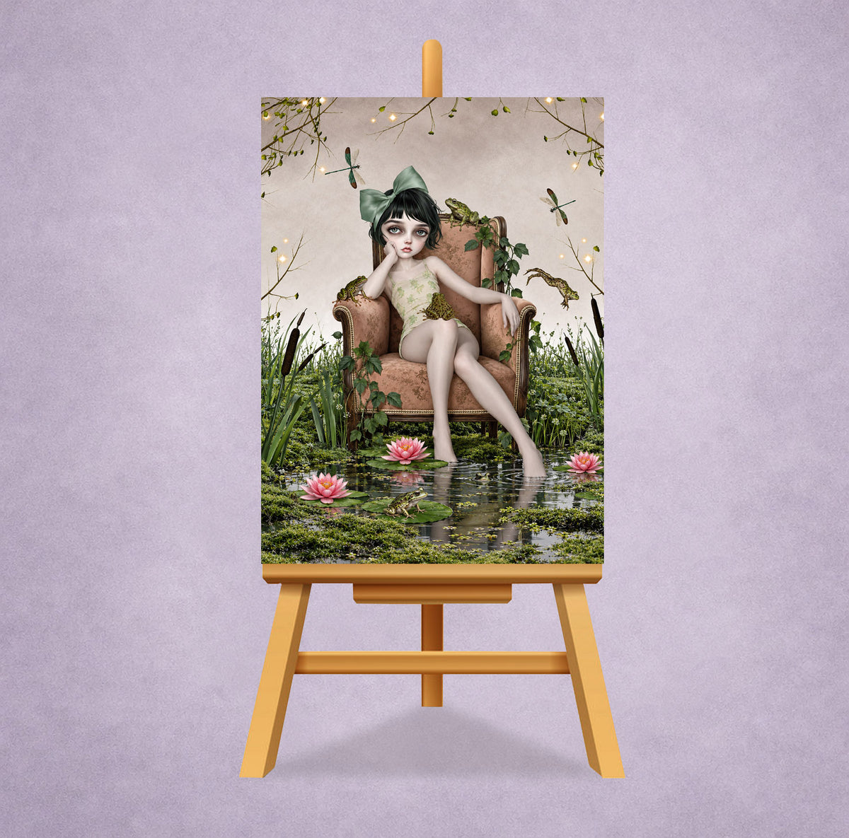 ACEO miniature art card in a small display stand featuring a girl in a sage green hair bow sitting in an armchair inside a mossy lily pond with frogs and dragonflies