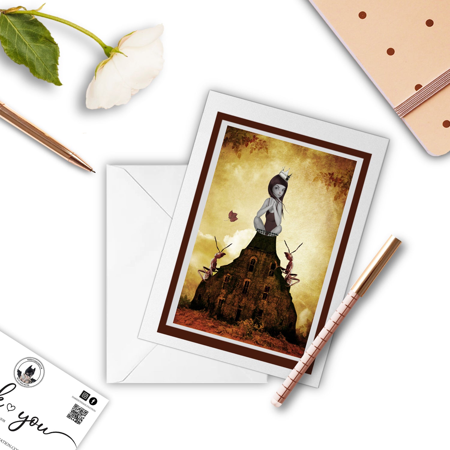 Girl And Red Ants Art Greeting Card with pen and other stationary items arranged around it.