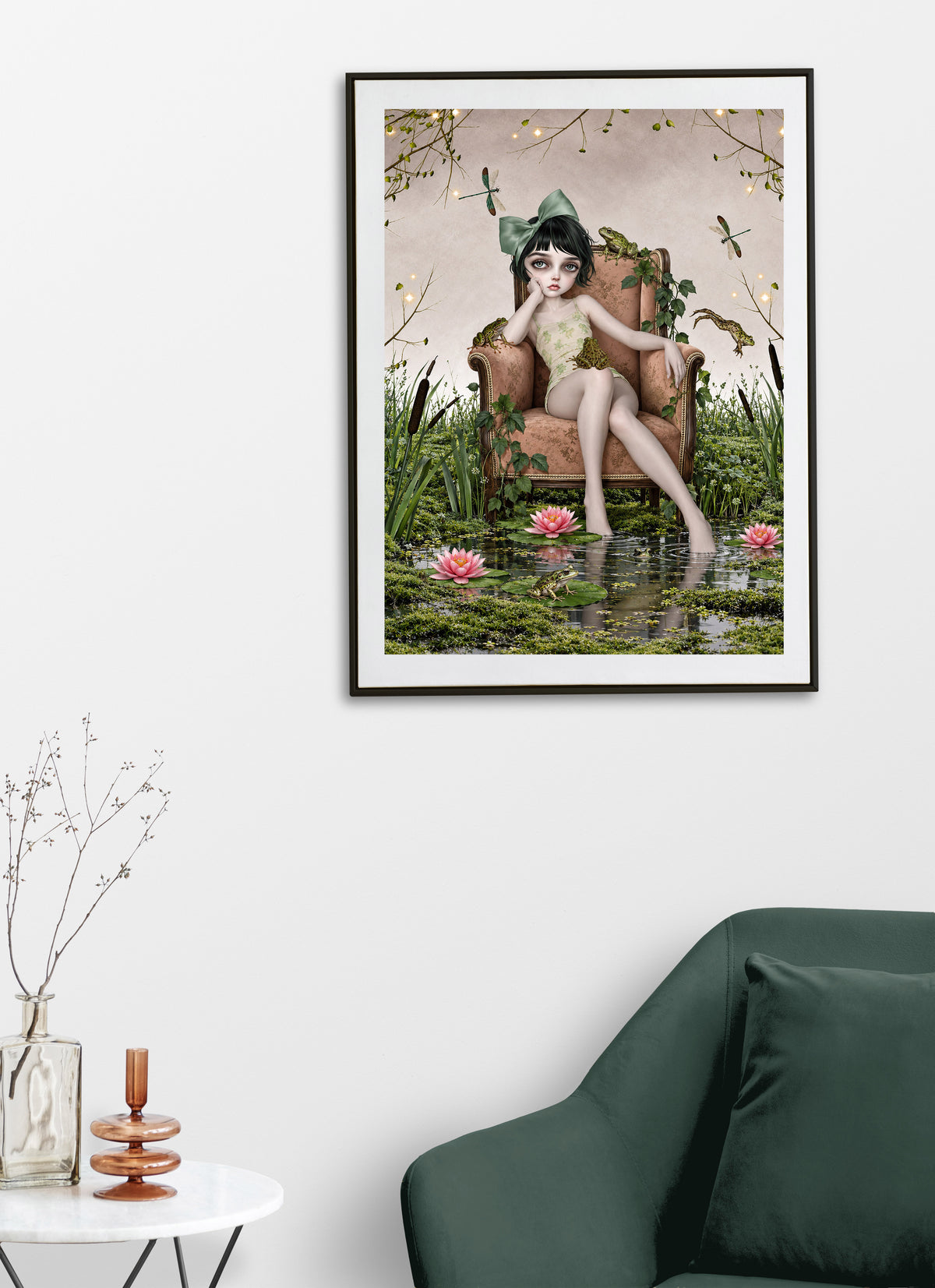 Dark cottagecore fine art print on a living room wall featuring a girl on an armchair in an enchanted lily pond with frogs and dragonflies.