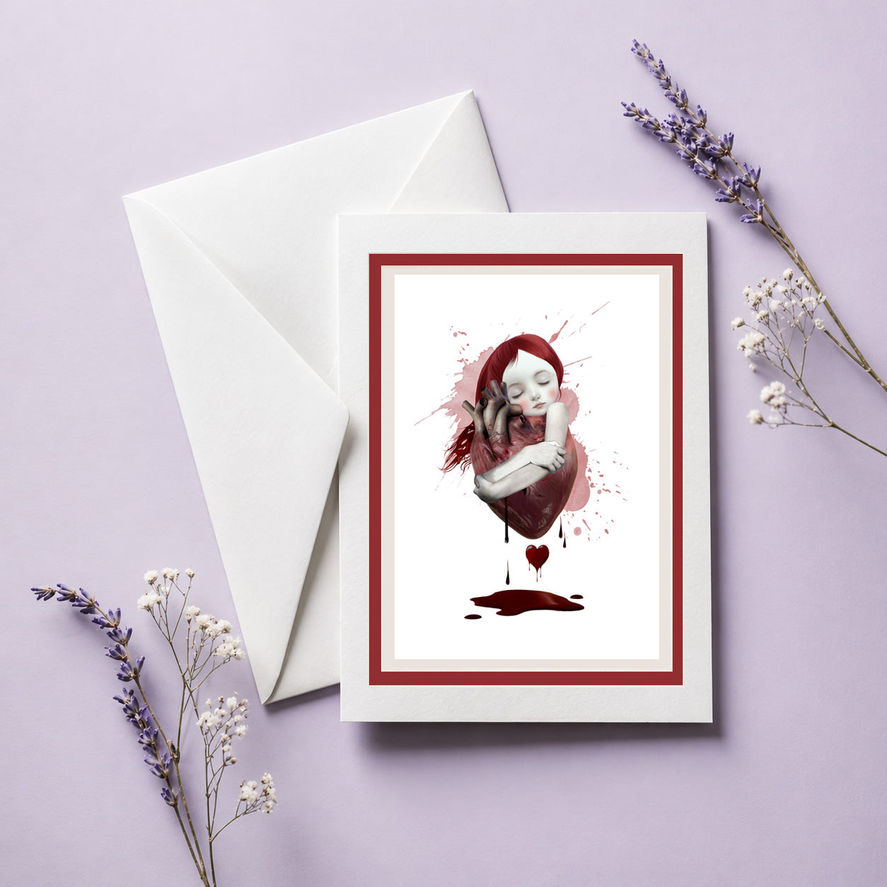 surreal gothic greeting card features a red hair girl hugging an anatomical heart, Card comes with envelope