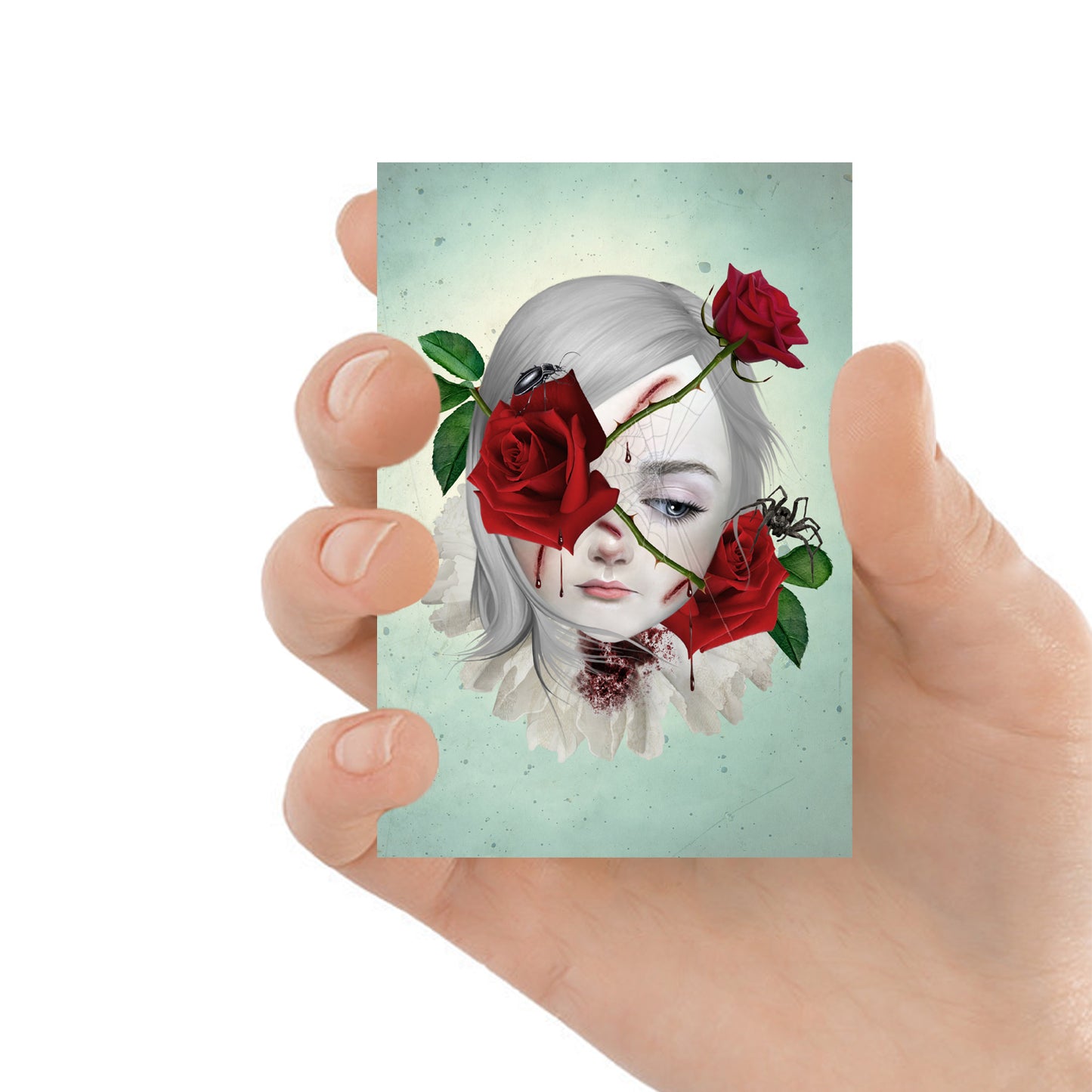 ACEO art card featuring a girl with red rose and thorns entwined around her face, held in hand—creepy cute gothic art style with dark, whimsical elements.