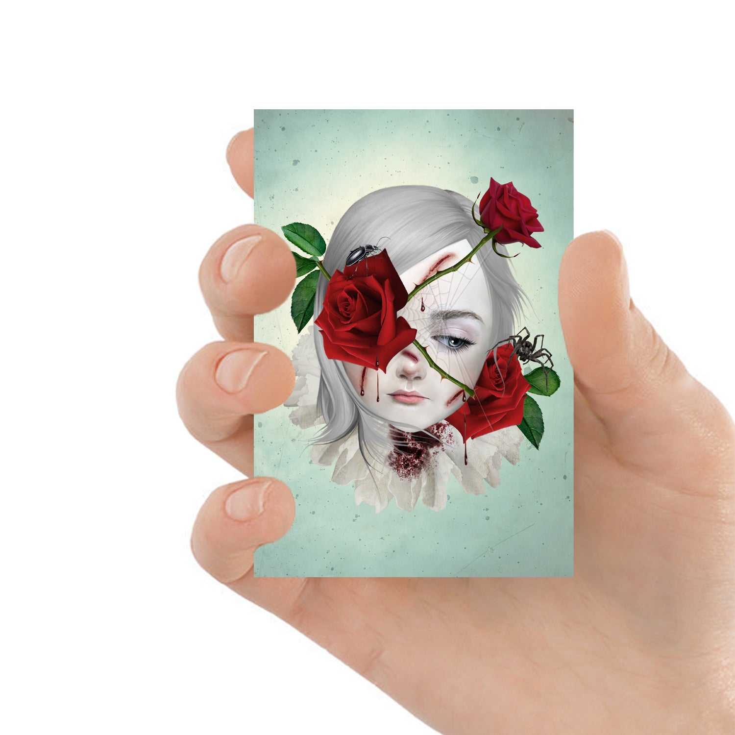 ACEO art card featuring a girl with red rose and thorns entwined around her face, held in hand—creepy cute gothic art style with dark, whimsical elements.