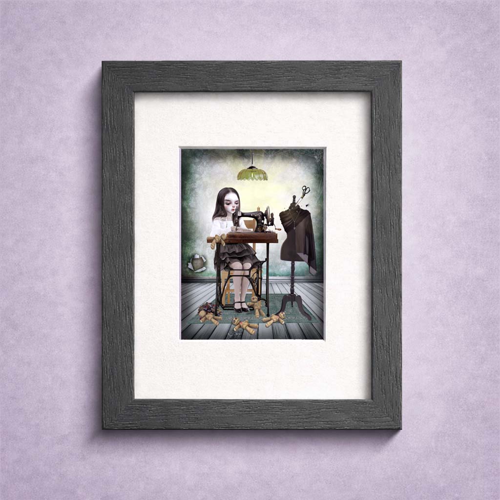 Girl Sewing Voodoo Dolls ACEO art card in a small display stand
