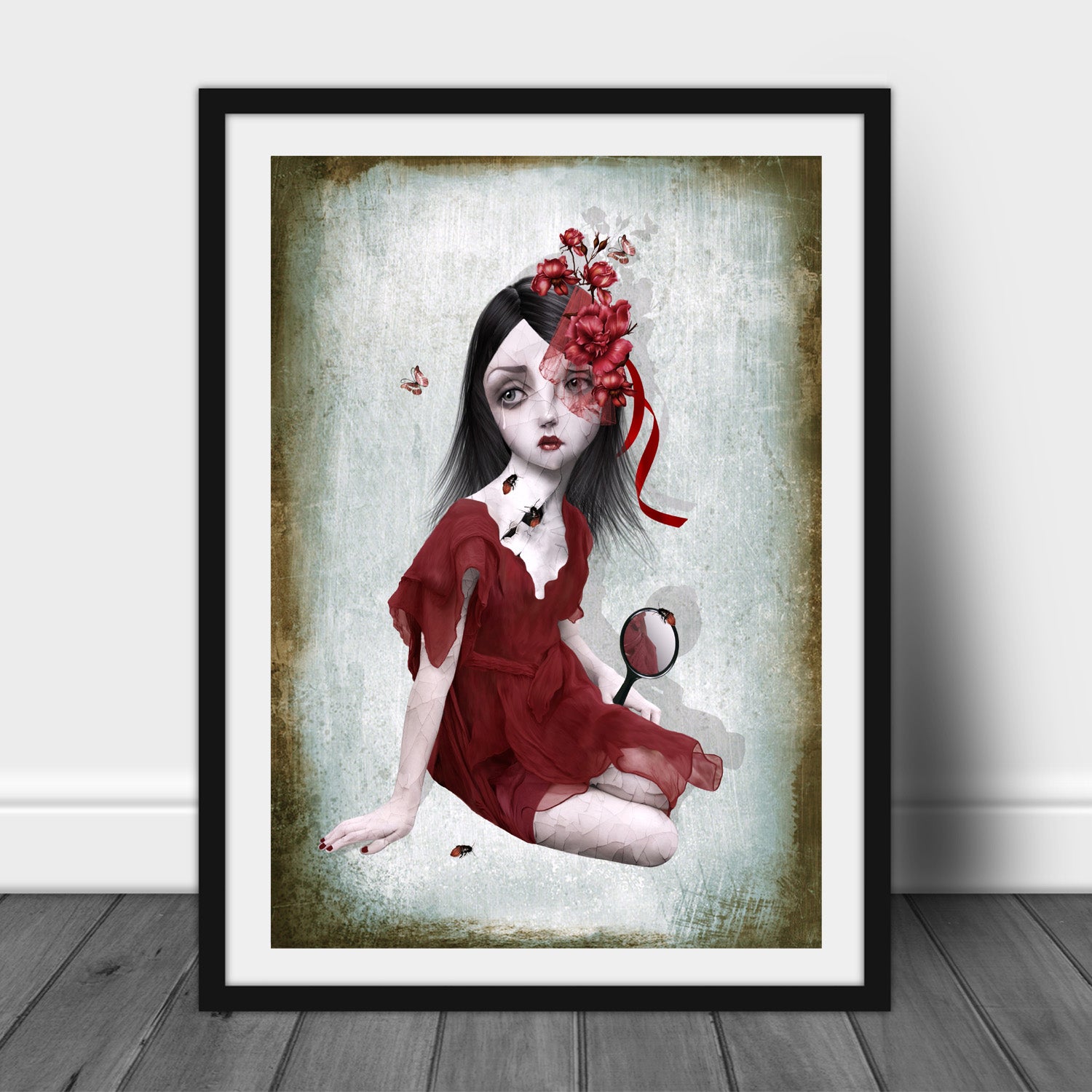 Framed art print display of a girl with cracked porcelain skin, with bugs crawling out from the cracks. 