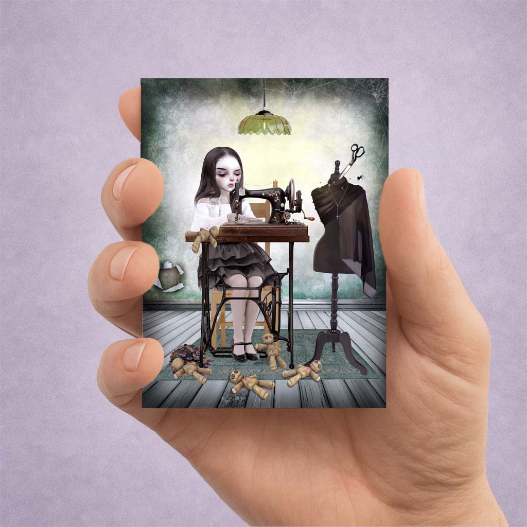 Girl Sewing Voodoo Dolls ACEO art card featuring spooky gothic imagery, creepy cute lowbrow style and whimsical miniature fantasy artwork.