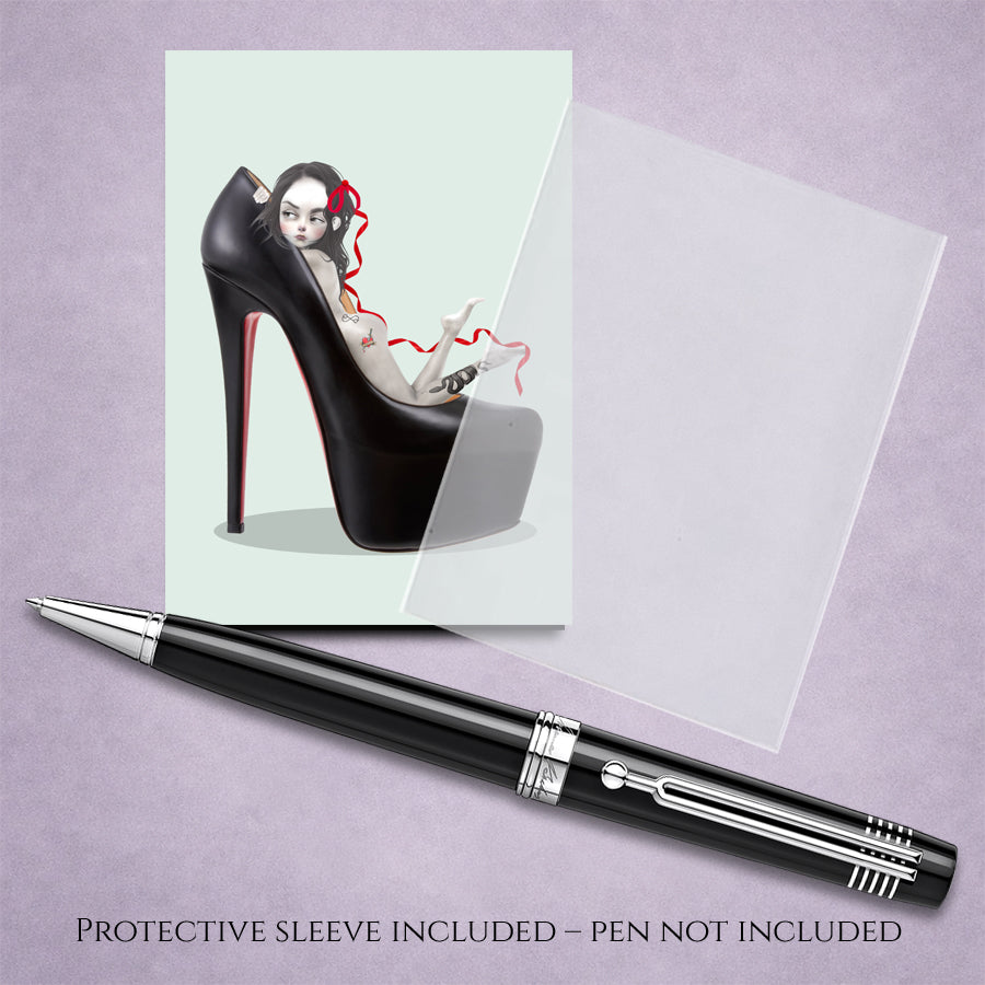 pop surrealism ACEO art card with protective sleeve. Features a tattooed girl in a black stiletto high heel