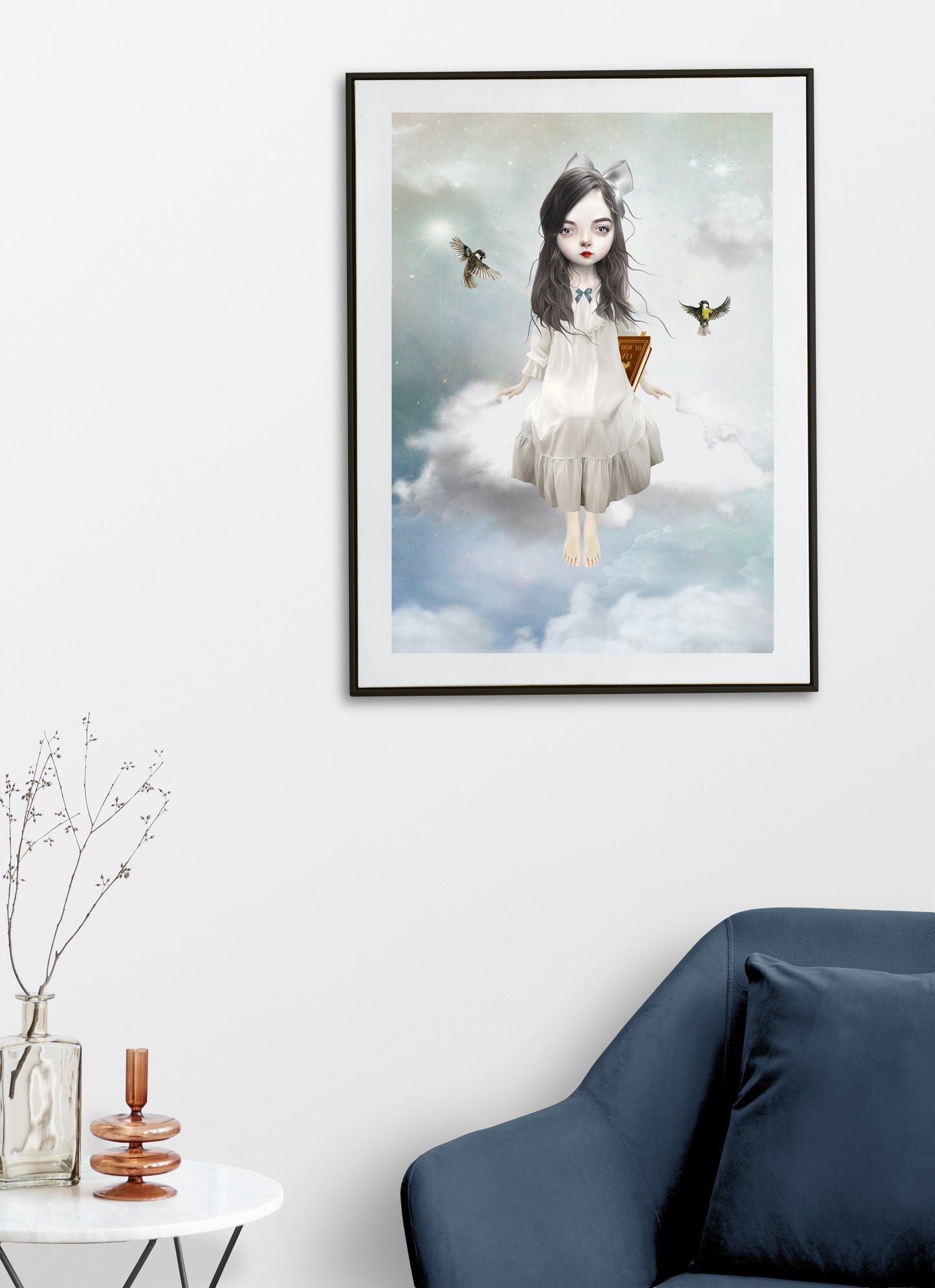 Girl sitting on a cloud art print hanging on the wall of a modern living room. Perfect for adding a dreamy touch or alternative home decor.