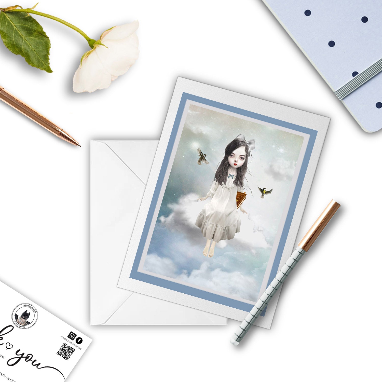 Cloud Girl greeting card beside a notebook and pen – perfect for gifting or writing a whimsical, poetic note.