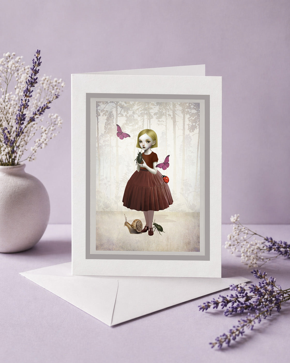 Greeting card with a girl holding a beetle  surrounded by butterflies, Ladybird and snail on a purple background.