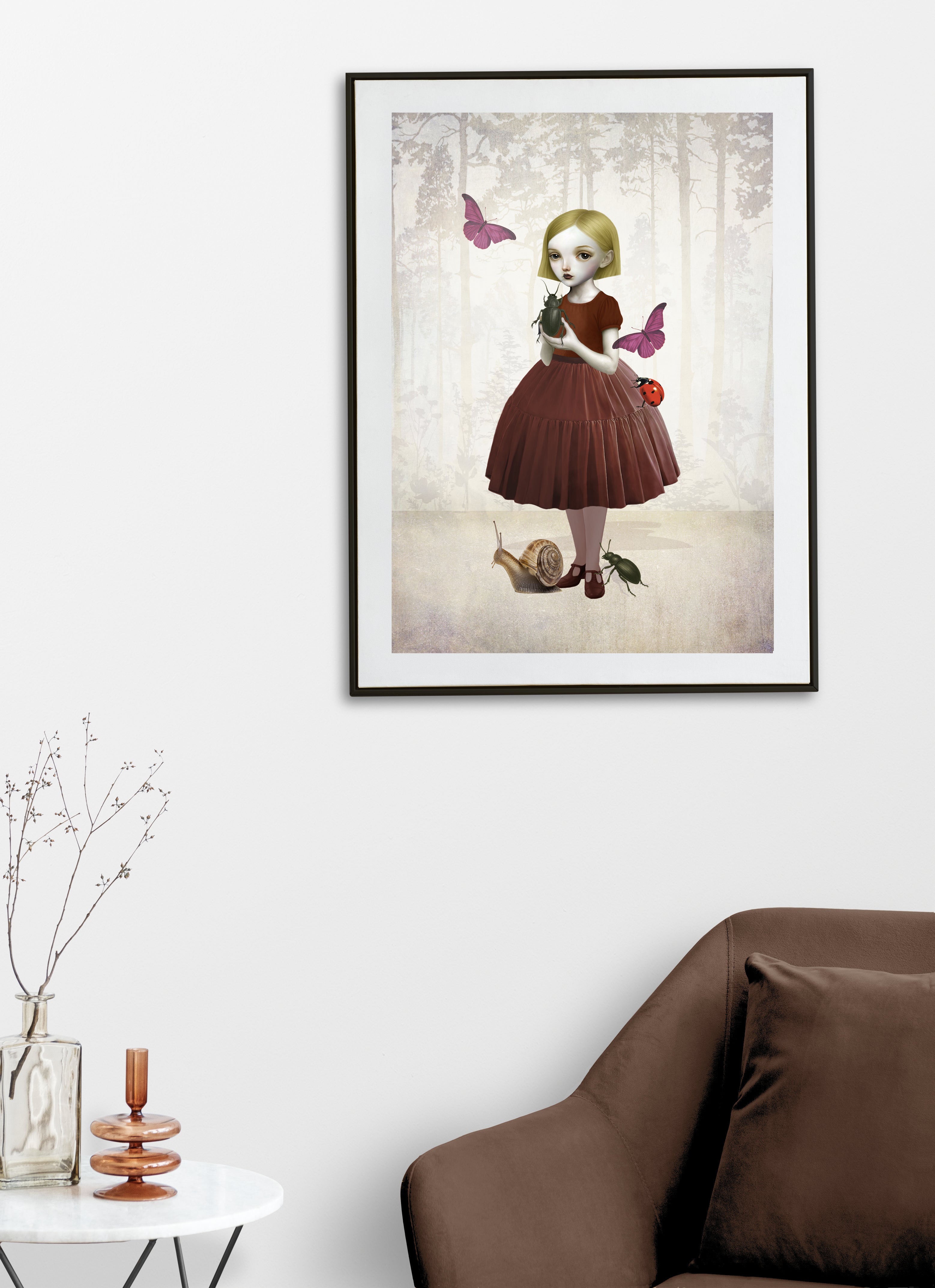 Framed artwork of a girl with butterflies in a living room setting.
