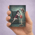 ACEO art print featuring a miniature dark surrealism illustration of a girl, a vulture, and raw meat.