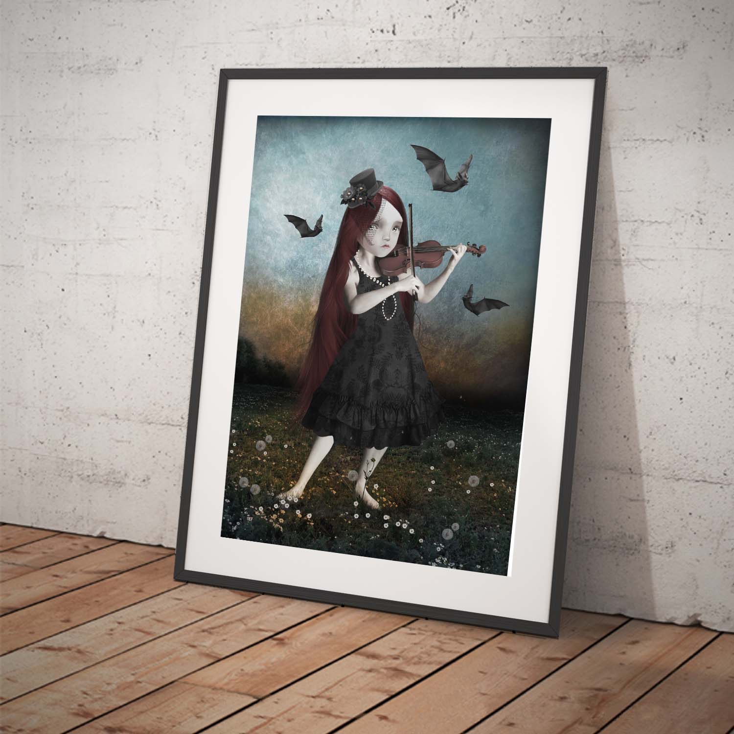 Goth Girl and Bats Wall Art Framed leaning against a wall.