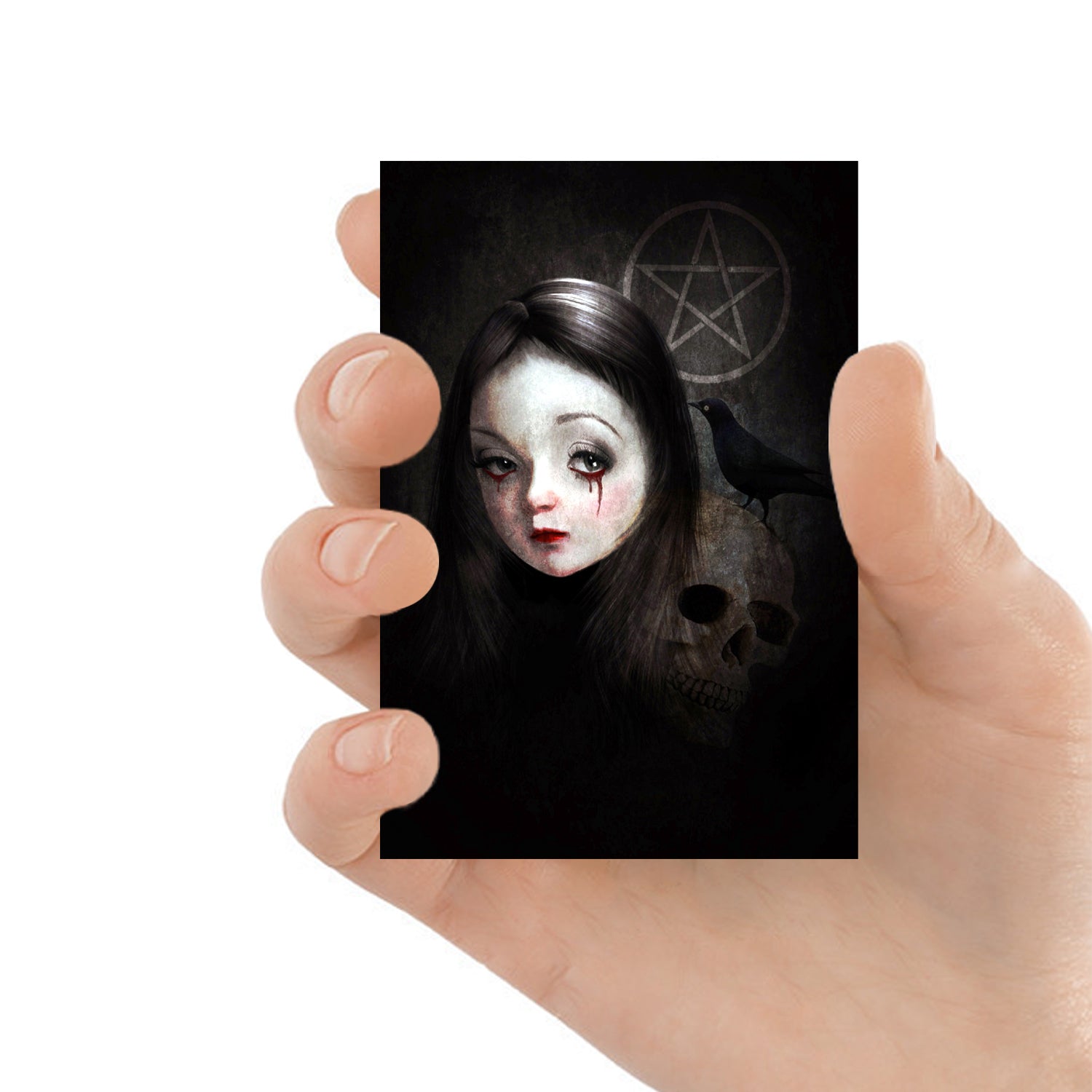 ACEO artist trading card features a gothic girl with bleeding eyes, accompanied by a human skull and a blackbird