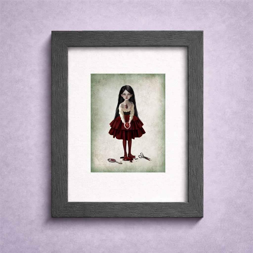 ACEO art card displayed in a miniature frame featuring a gothic girl holding a bleeding anatomical heart with a broken mirror at her feet.