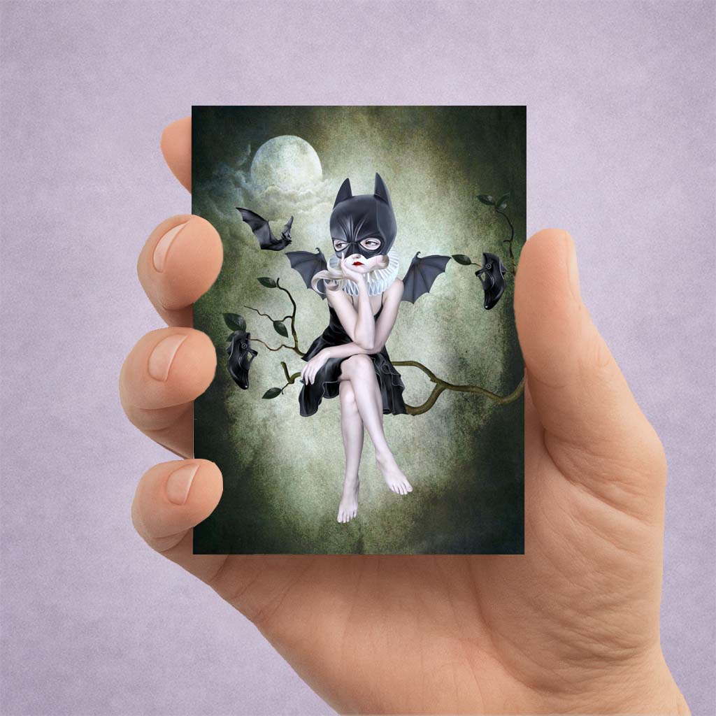 Gothic Bat Girl ACEO Art Card held in a hand to show miniature scale.