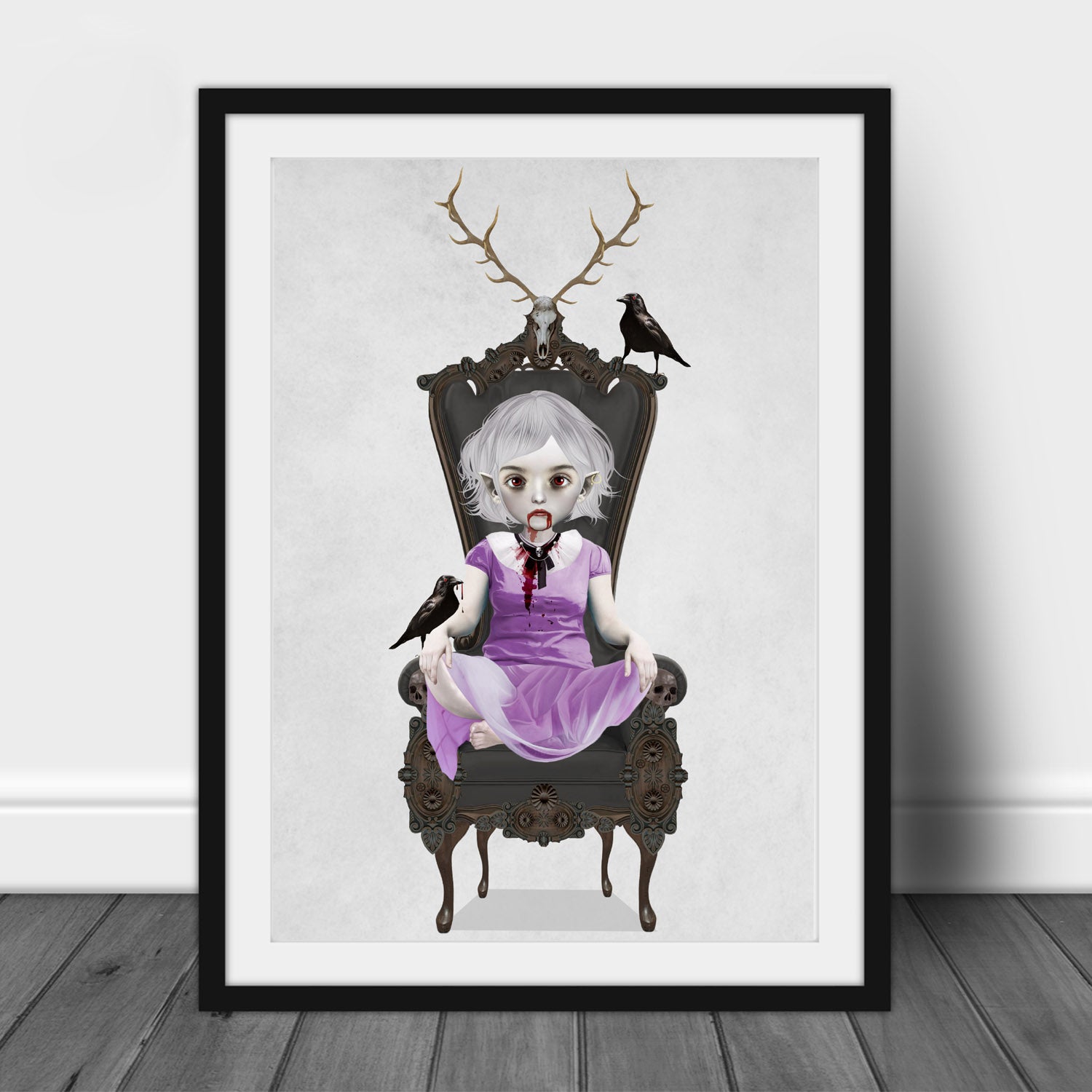 Gothic fantasy Art Print in black frame featuring a captivating vampire girl sitting in an ornate chair, her loyal ravens by her side.