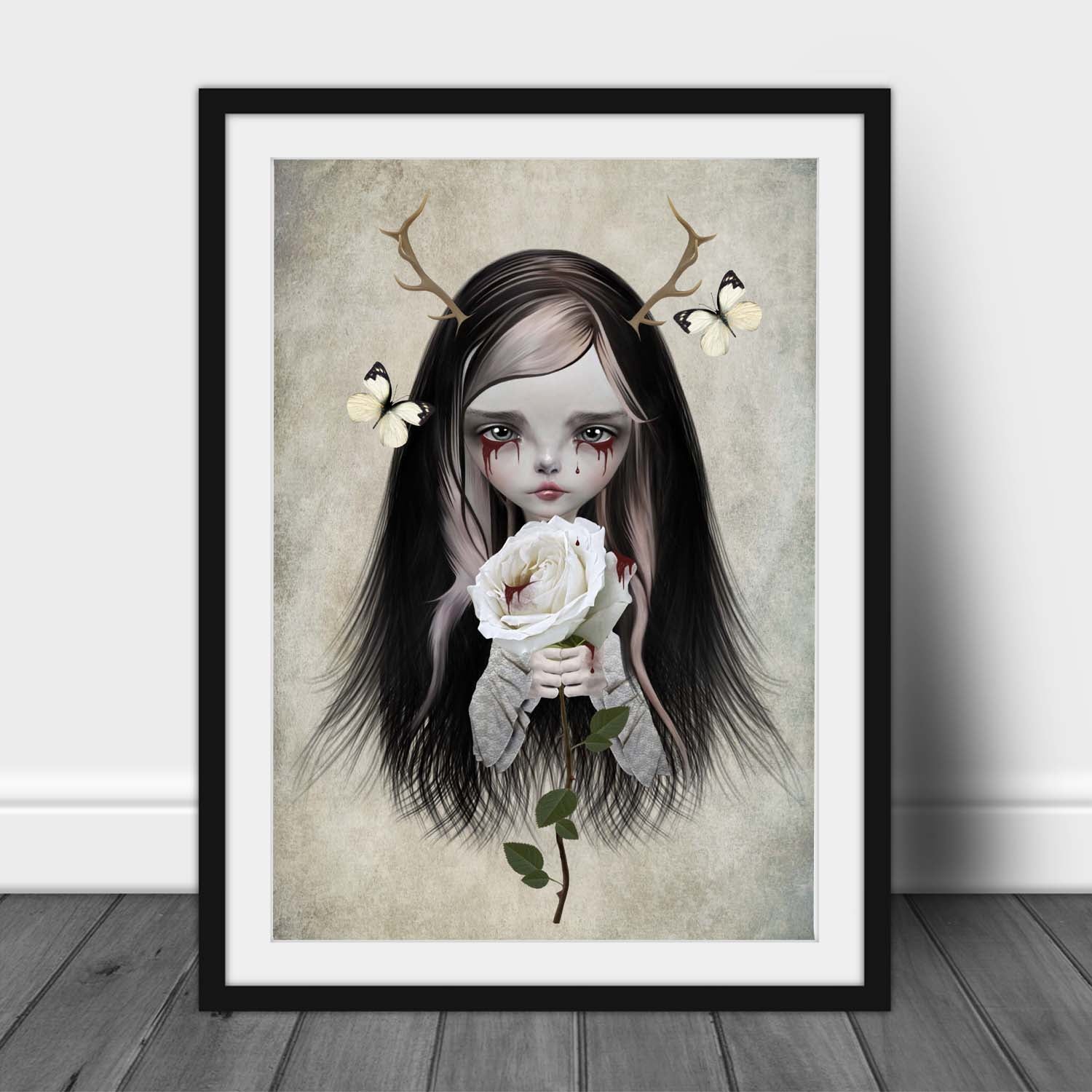 Gothic Fairy Tale Art Print. An antlered girl with blood dripping from her eyes and clutching a white rose.