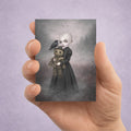 Gothic ACEO Card features a pale, platinum-haired girl holding a stitched, creepy-cute scarecrow doll. Accompanied by a watchful black crow amidst a misty, atmospheric landscape,