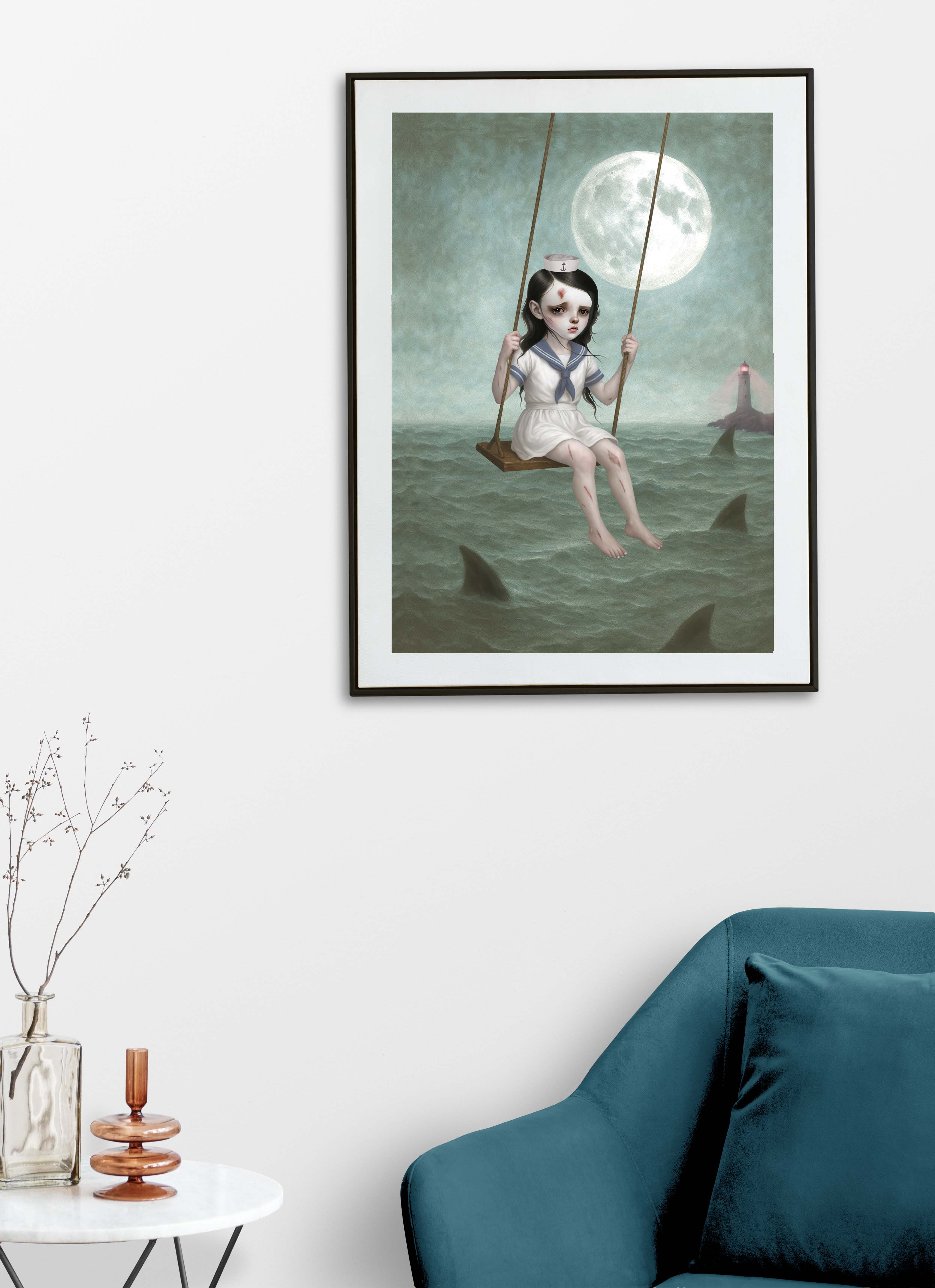 Gothic sailor girl ocean artwork displayed above blue chair in modern living room setting.