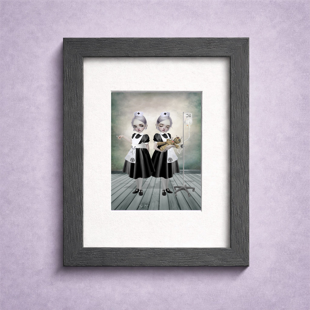Framed ACEO artwork of two gothic nurses with a voodoo doll as a patient. 