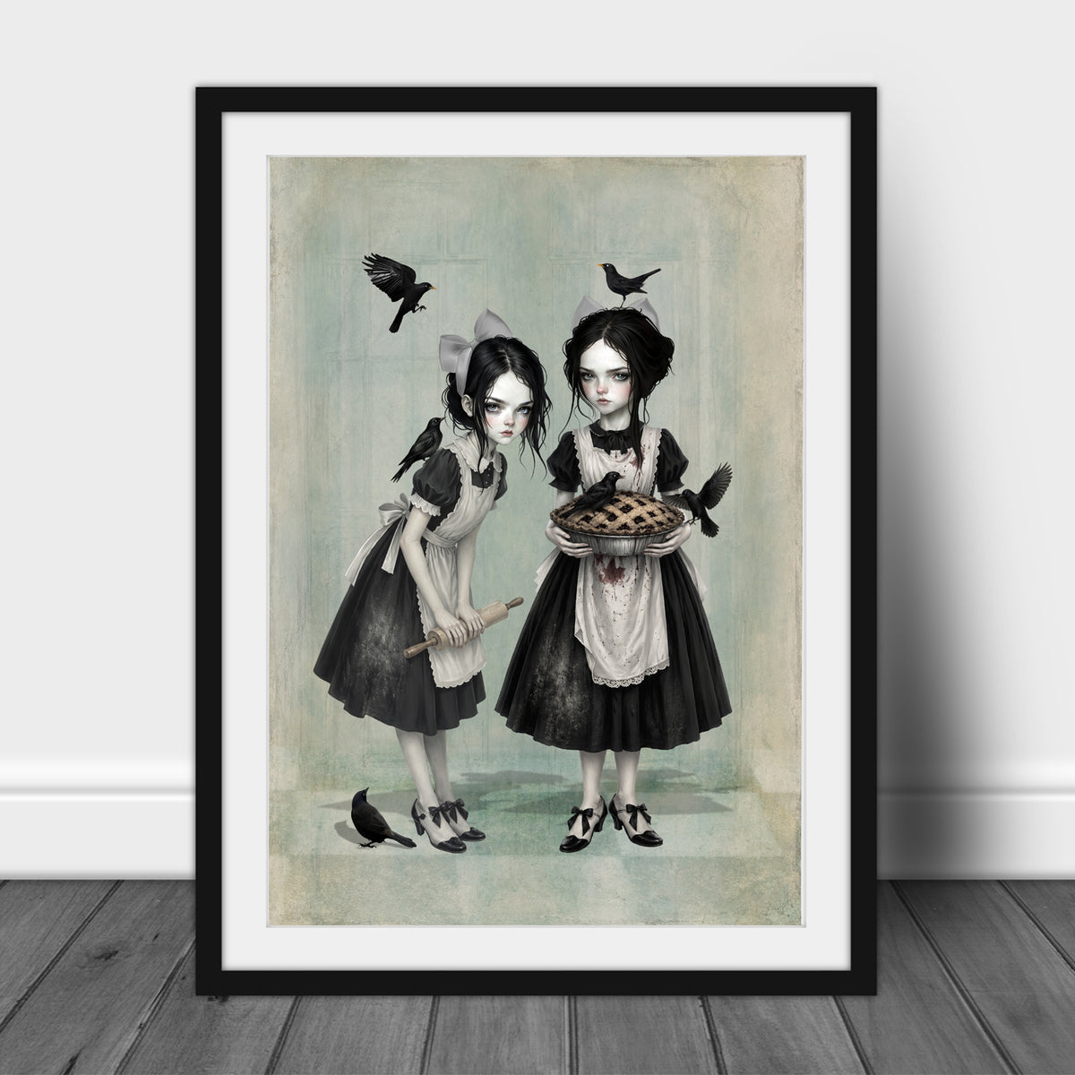 Dark cottagecore fine art print in an A3 frame featuring twin gothic girls in aprons holding a pie and rolling pin, surrounded by blackbirds