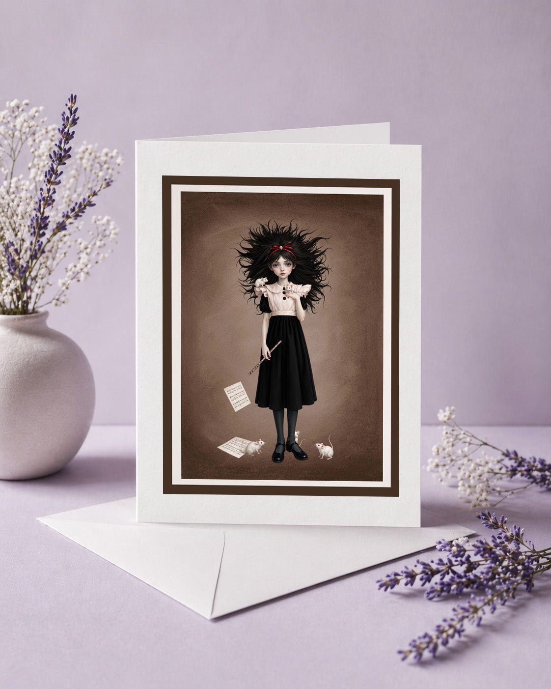 Blank gothic art greeting card featuring a girl holding a flute with white mice perched on her dress, displayed vertically with a white envelope and dried lavender accents.