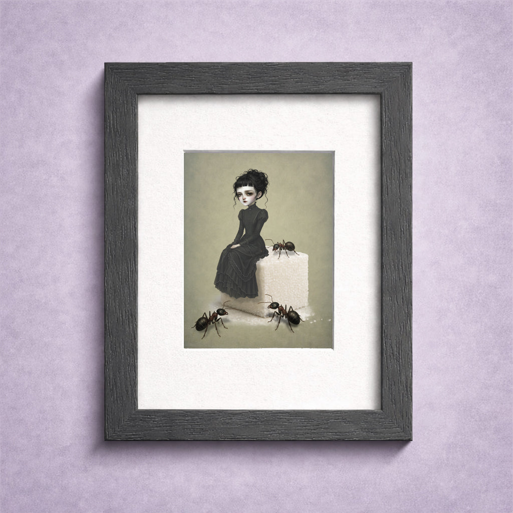 Framed  gothic ACEO art card featuring a surreal illustration of a girl on a giant sugar cube with large ants.