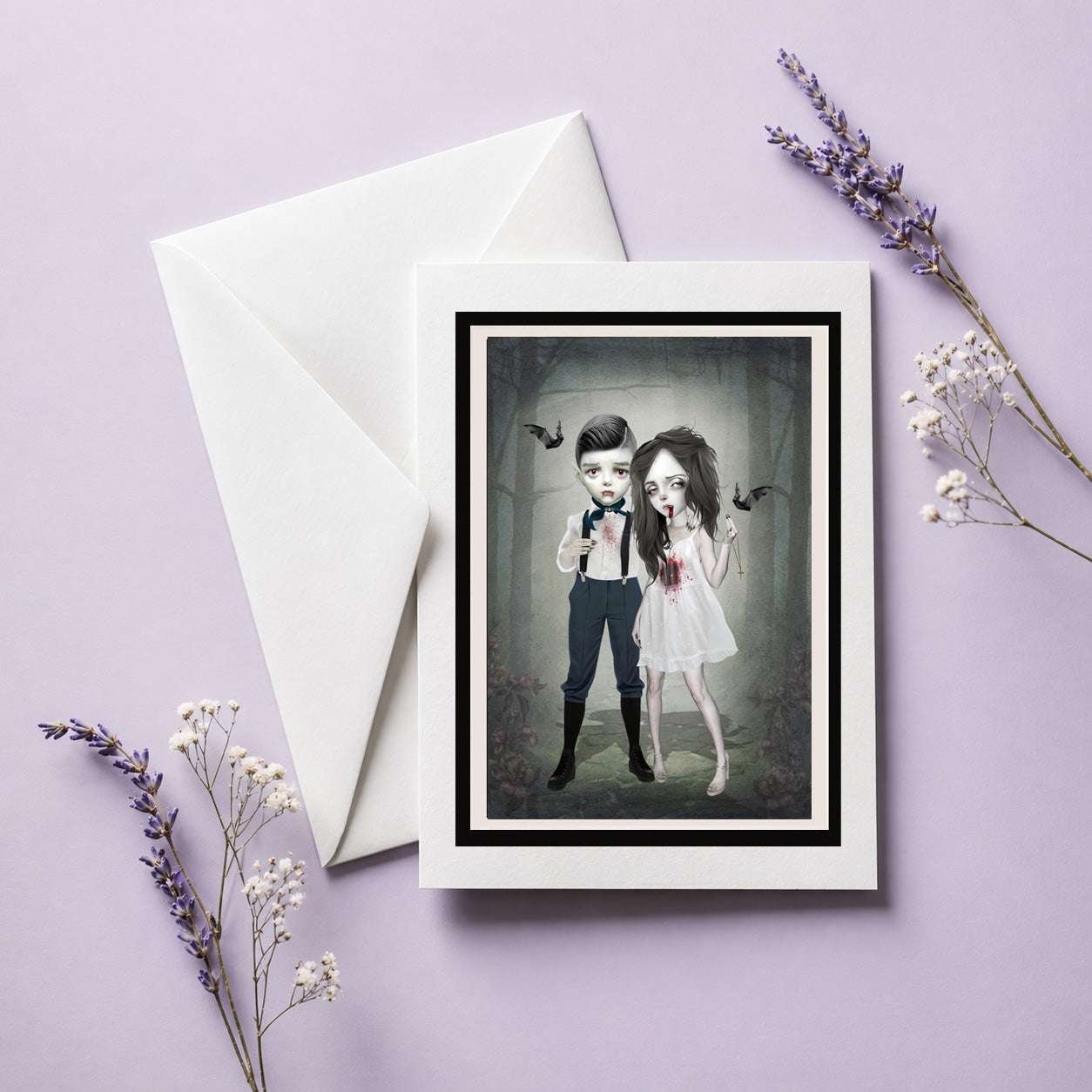 Greeting card with a creepy cute illustration of a vampire couple on a purple background