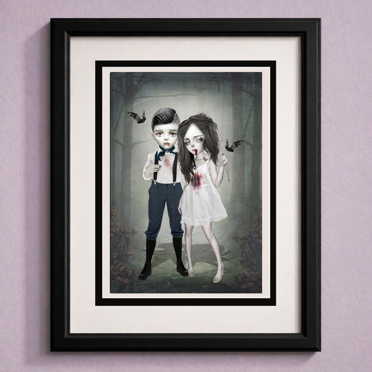 Framed artwork of a boy and girl vampire  in a dark, eerie setting.