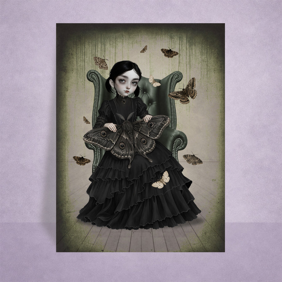 2.5x3.5 inch ACEO art trading card featuring a gothic girl in a black Victorian dress sitting in an armchair with giant moths displayed against a lilac background.