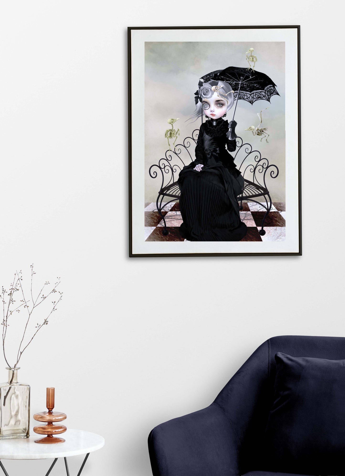 Victorian lady and skeleton birds print on living room wall. Depicting a somber woman adorned in black, surrounded by the eerie remains of her beloved birds. 