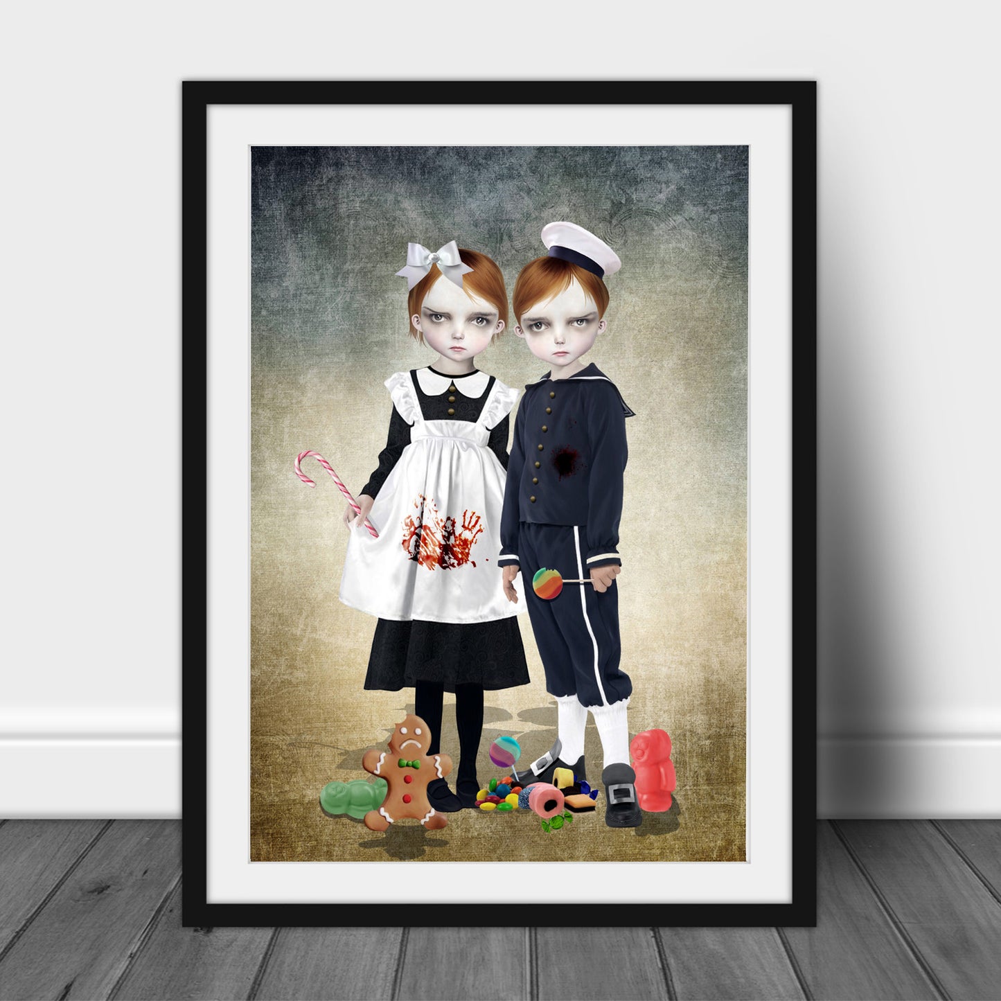  Creepy cute framed art print of Hansel And Gretel with sweets scattered around their feet.