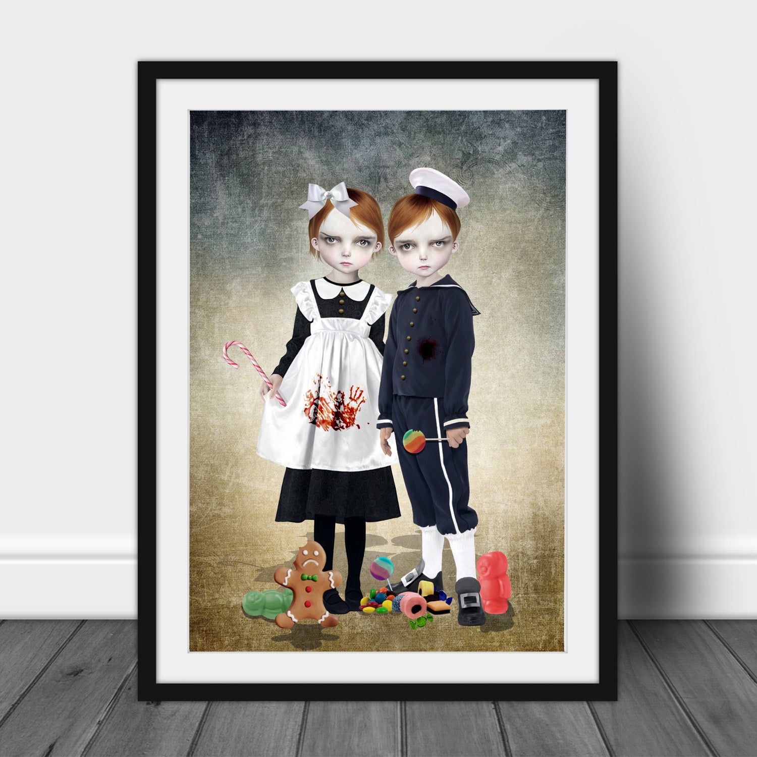  Creepy cute framed art print of Hansel And Gretel with sweets scattered around their feet.