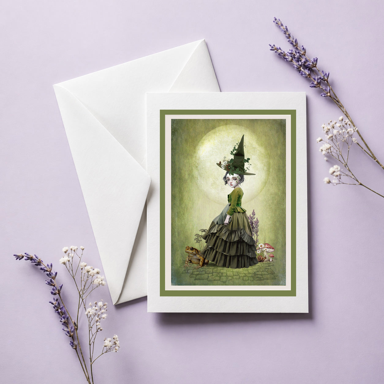 Green witch and toad art greeting card  with envelope. Blank inside for your own message and perfectly sized for framing as a mini print.