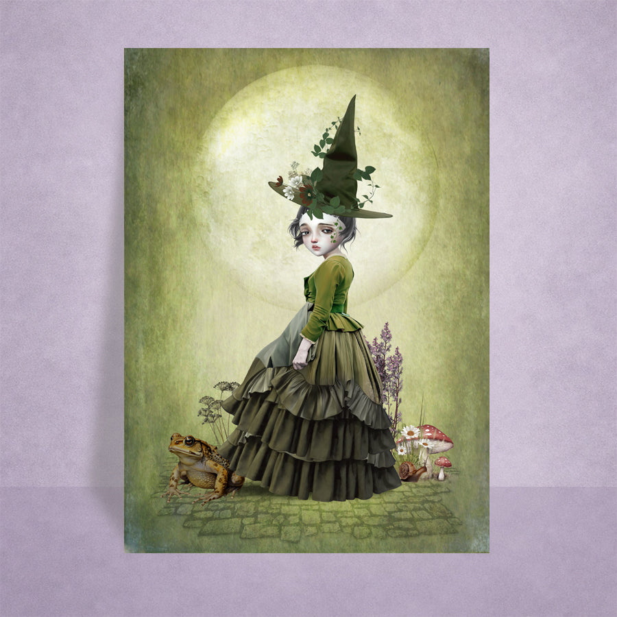 ACEO Art Card of a witch in a green dress with a hat, standing on a stone path with a moonlit background with a giant toad.
