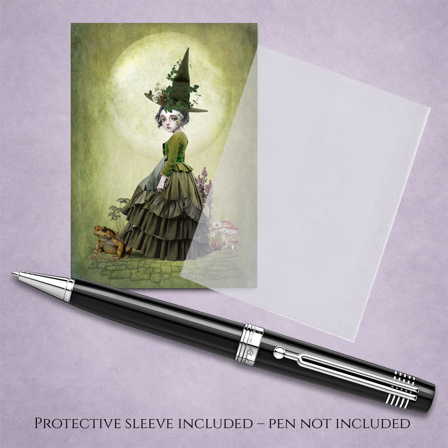 Collectible gothic witch ACEO art print and sleeve featuring a miniature dark fantasy illustration of a green witchling and giant toad.