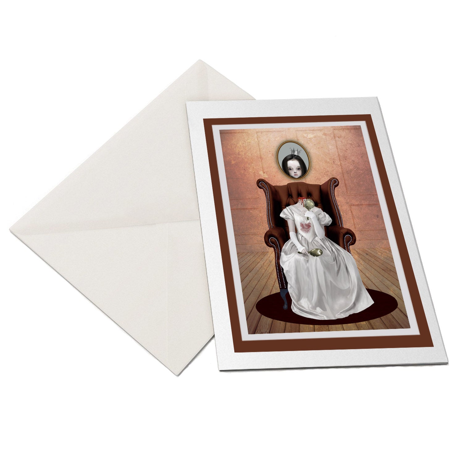  greeting card and envelope features a striking illustration of a headless woman in regal attire, seated gracefully in a chair while holding a hand mirror. Behind her, a haunting portrait of her crowned head adorns the wall.