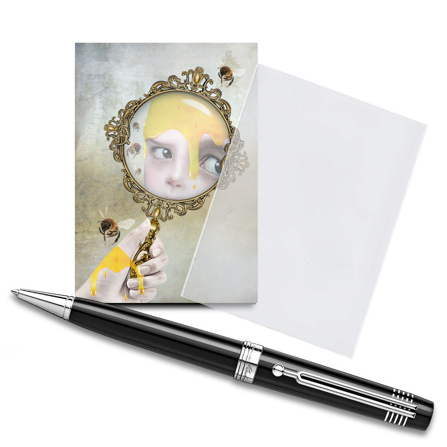 Artist trading card features a girl's reflection honey-covered in a hand mirror, surrounded by dancing honey bees