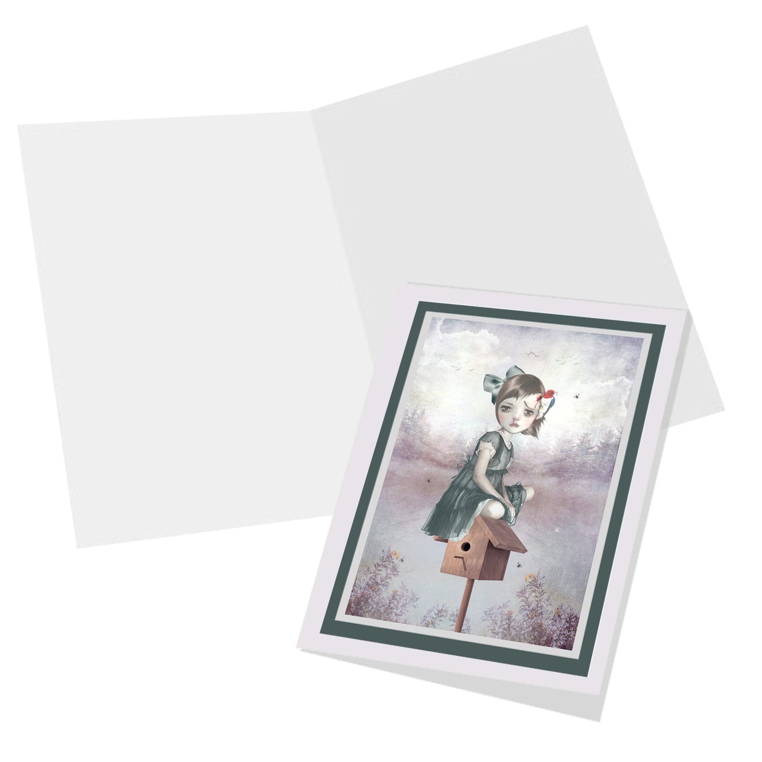 Inside of the card, is blank for your own personal message, with a surreal art print of a girl and woodpecker on the cover.