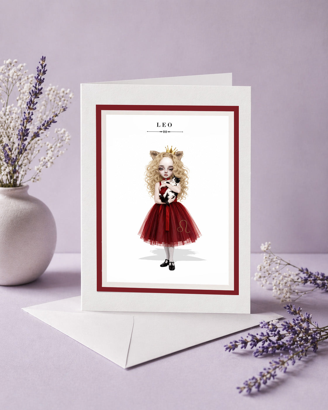 Leo zodiac birthday card featuring an illustration of a blonde maiden with lion ears and a gold crown, wearing a red dress and holding a cat.