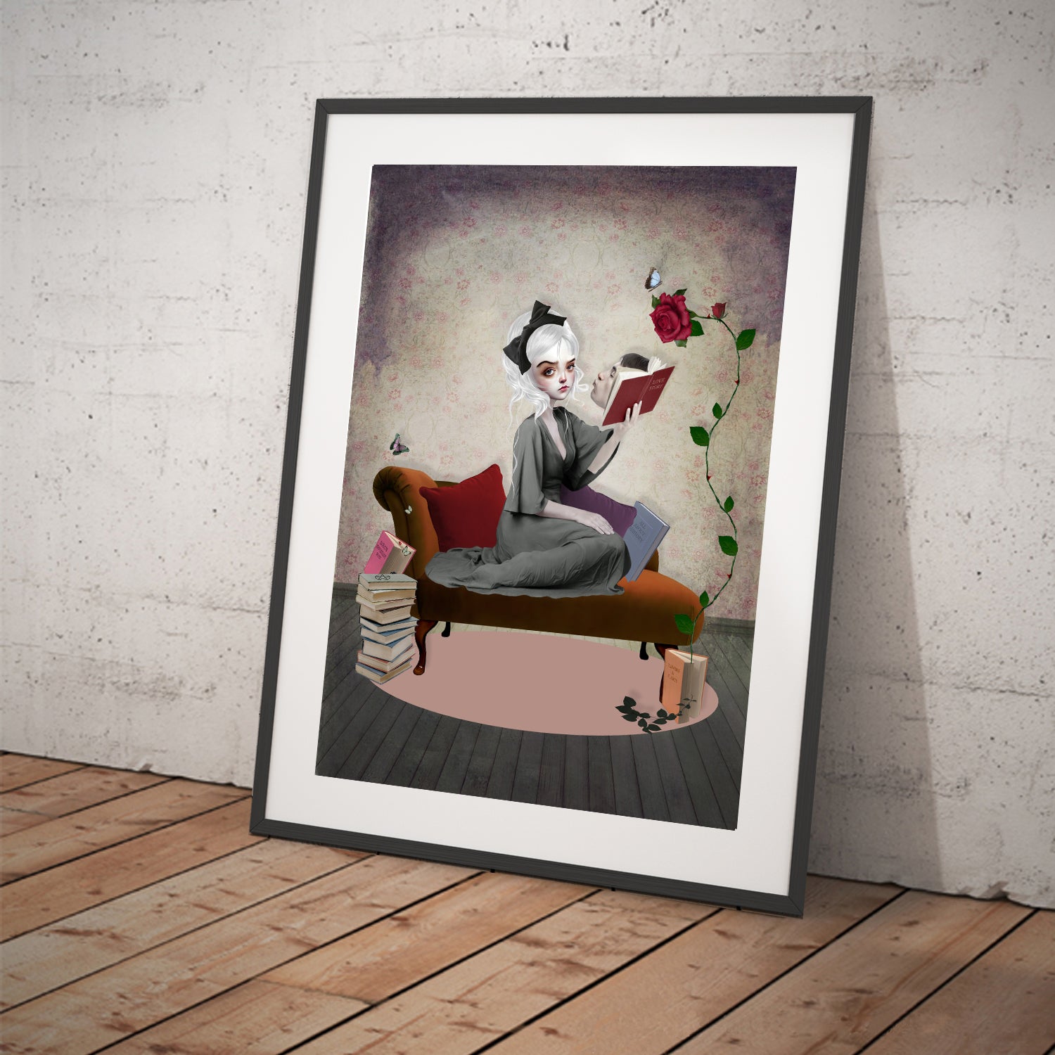 Framed girl reading books art print. The girl's surroundings come to life as she dives into each book, bringing them to come alive.