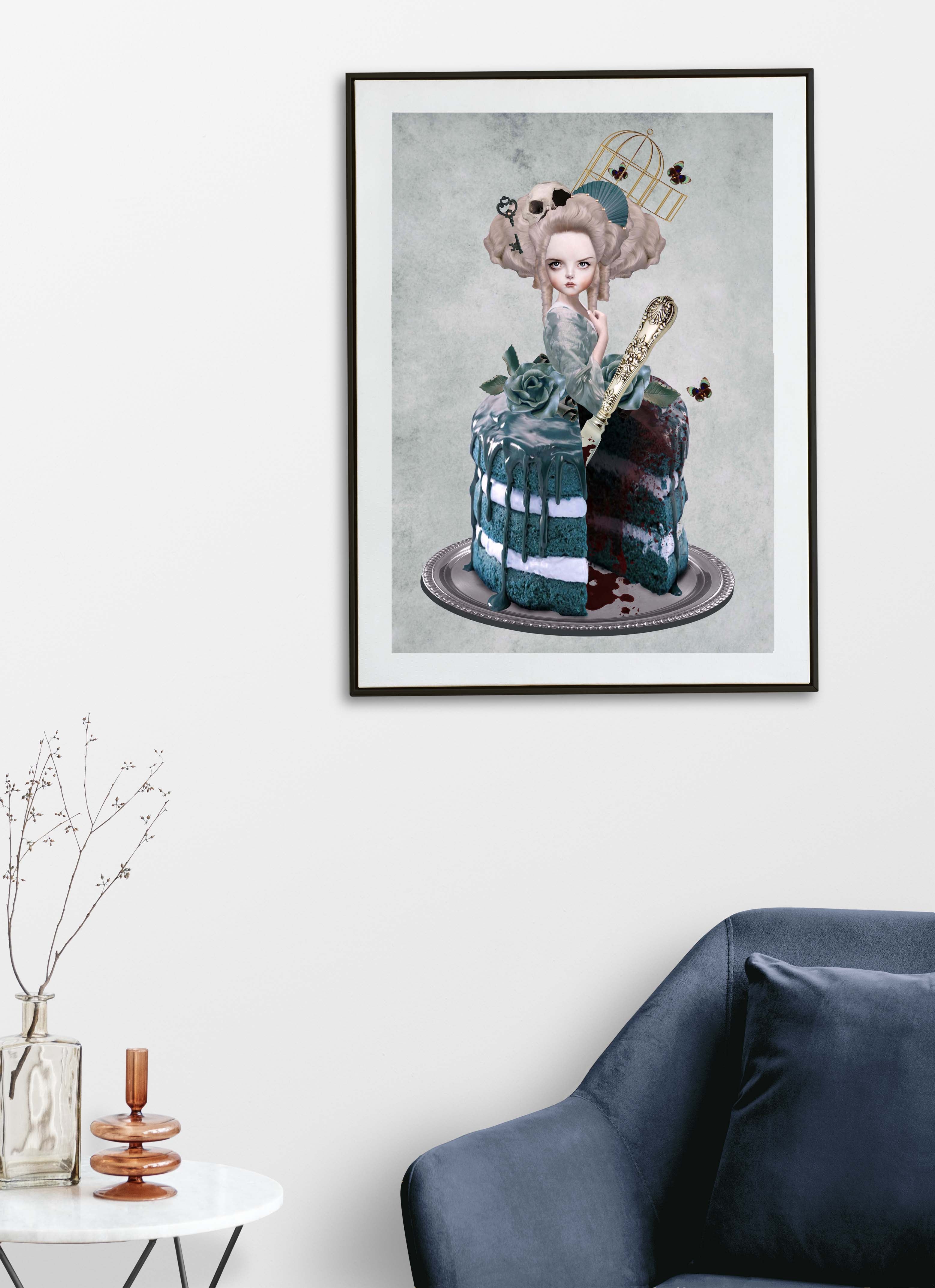 Framed artwork of a Marie Antoinette cake in a living room setting with a blue sofa and decorative items.