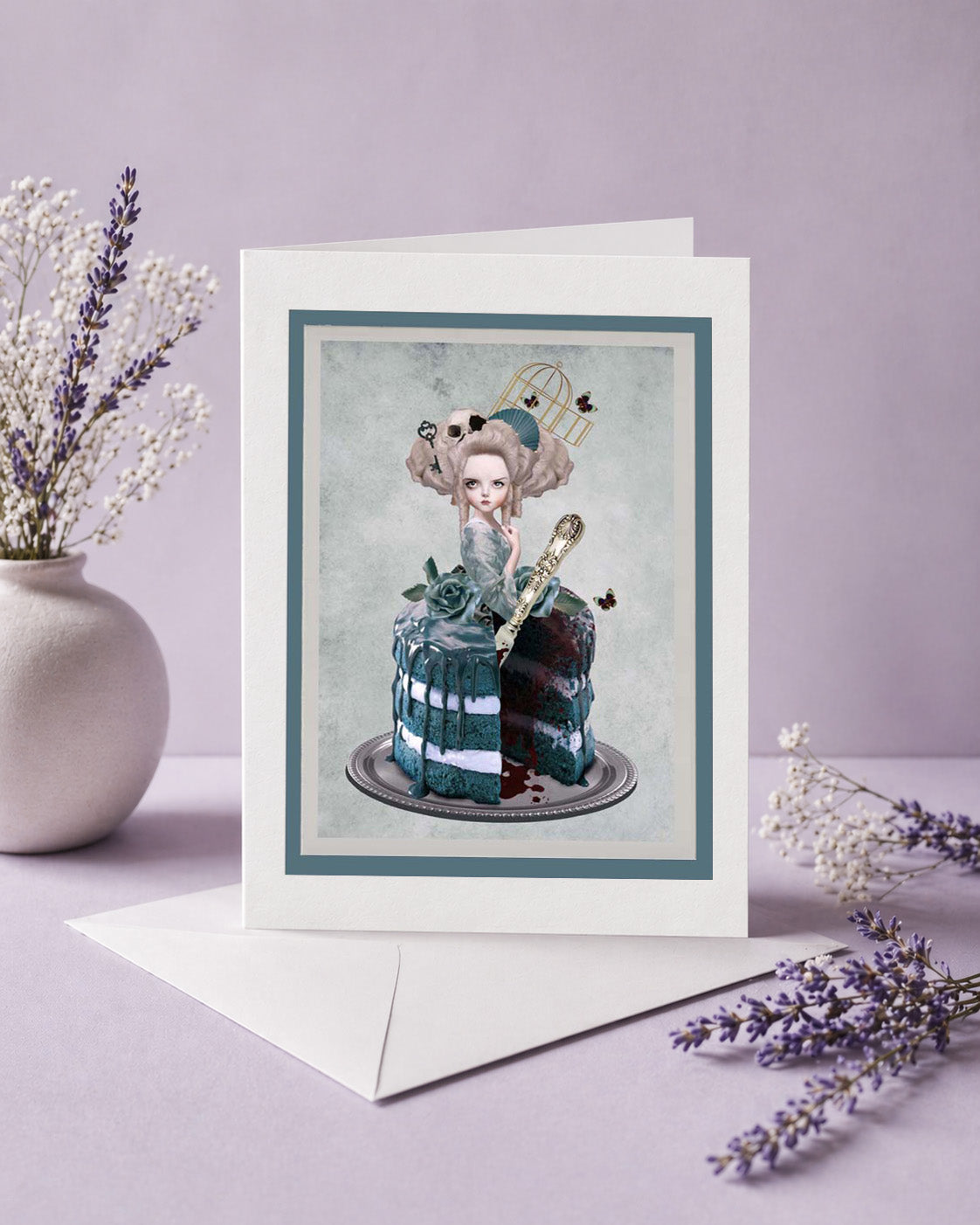 Greeting card with a decorative design of Marie Antoinette part cake, surrounded by lavender flowers on a light purple background.