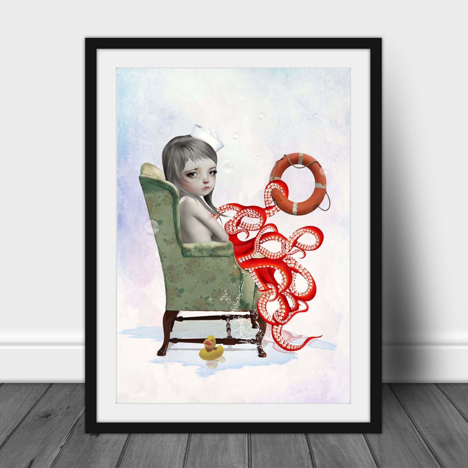 Framed pop surreal octopus girl wall art with pastel tones, whimsical nautical elements and imaginative ocean fantasy styling in a modern interior.