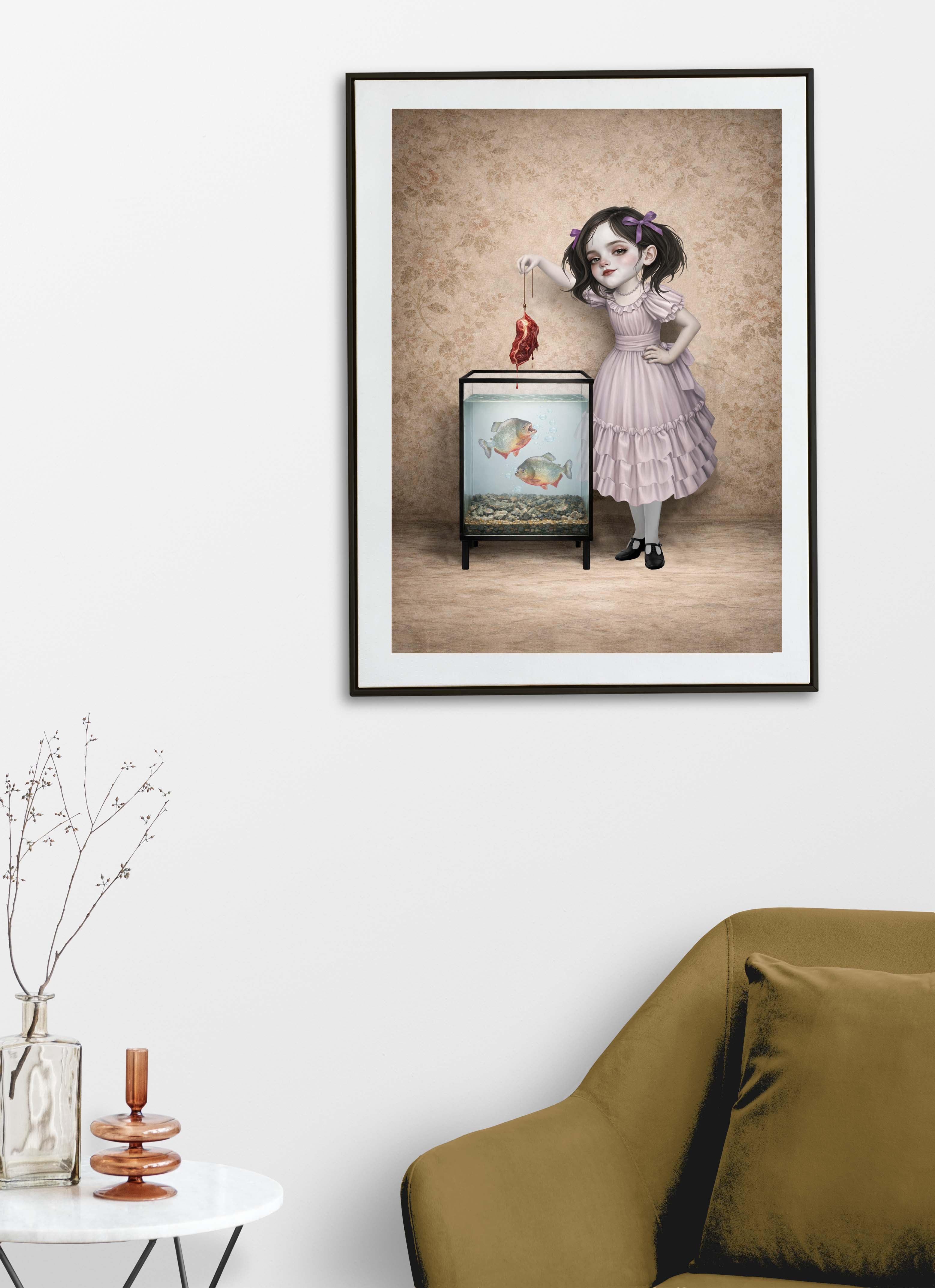 Creepy cute wall decor featuring a framed print of a piranha feeding illustration styled above a chair on a neutral-toned wall for a macabre home aesthetic.