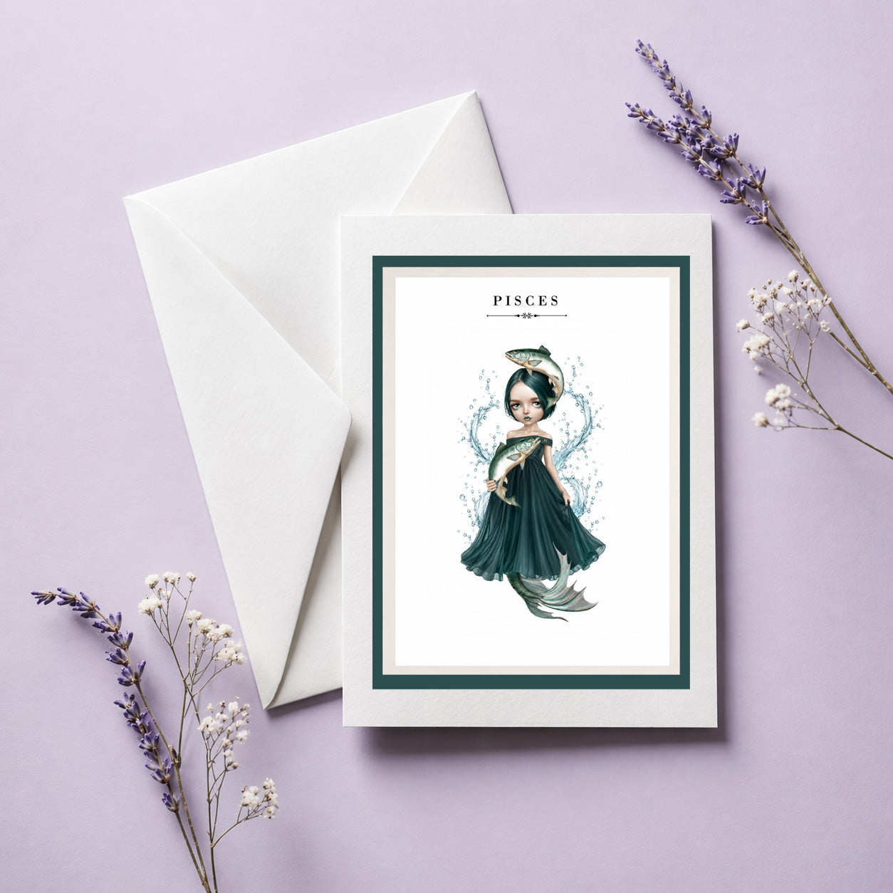 Pisces zodiac birthday card and envelope featuring an illustration of a dark-haired maiden in a deep teal dress with two fish and a mermaid tail, surrounded by splashing water.