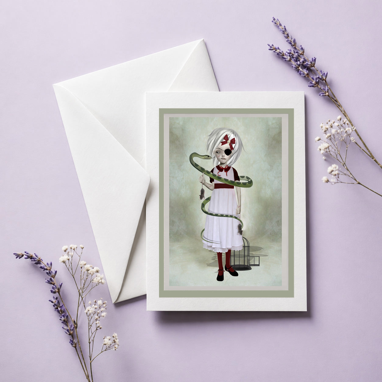 Greeting card with a quirky girl holding a snake and a birdcage, accompanied by a white envelope on a light purple background.