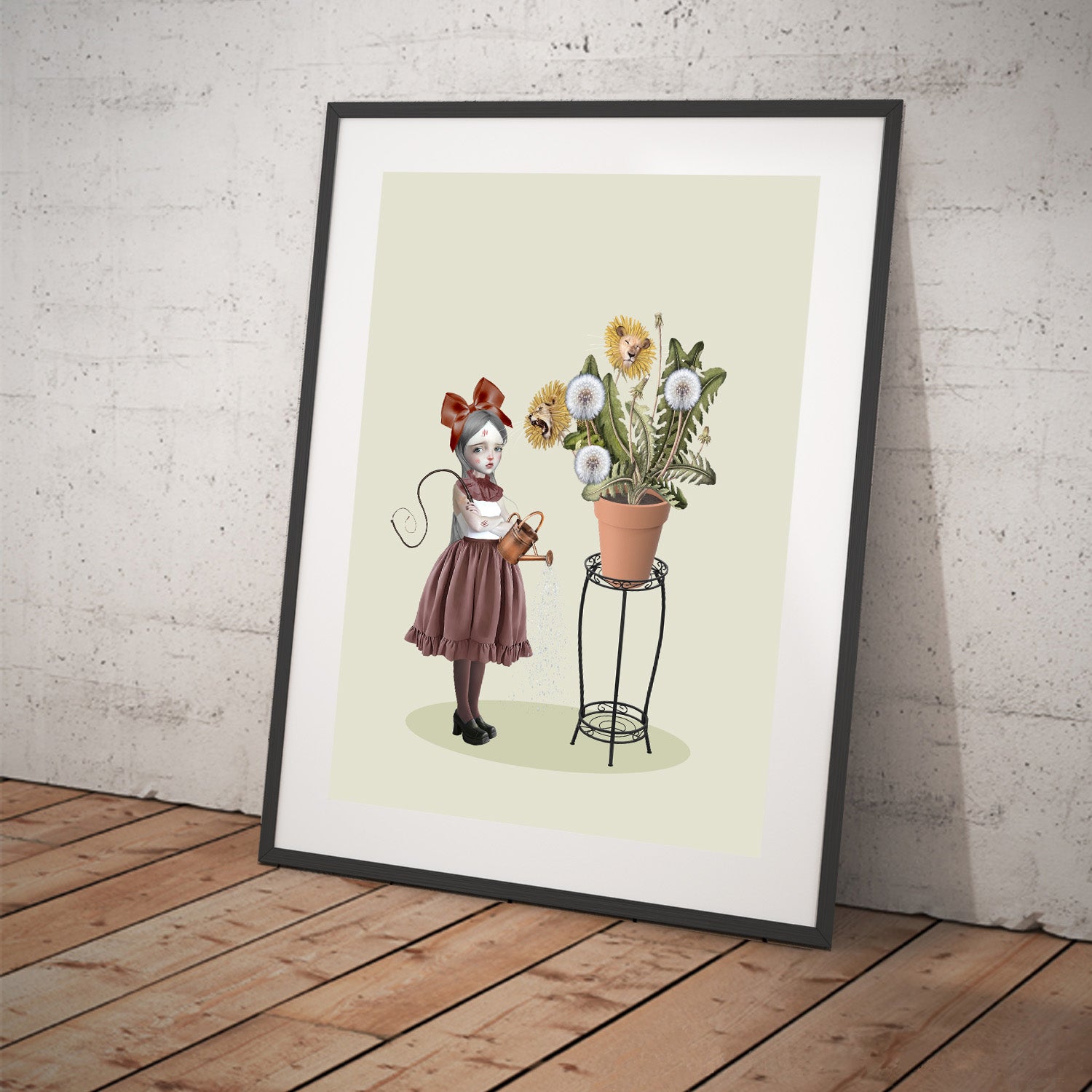 Framed Dandelion wall art print on wall, quirky image is a girl with scratches and cuts tending to her dandelion plant with real lion heads.