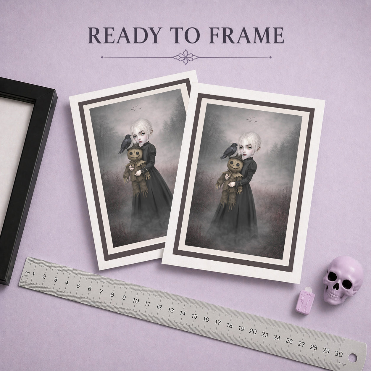 Ready to frame eerie greeting card features a pale, platinum-haired girl in a dark Victorian-style dress cradling a stitched, creepy-cute scarecrow doll.