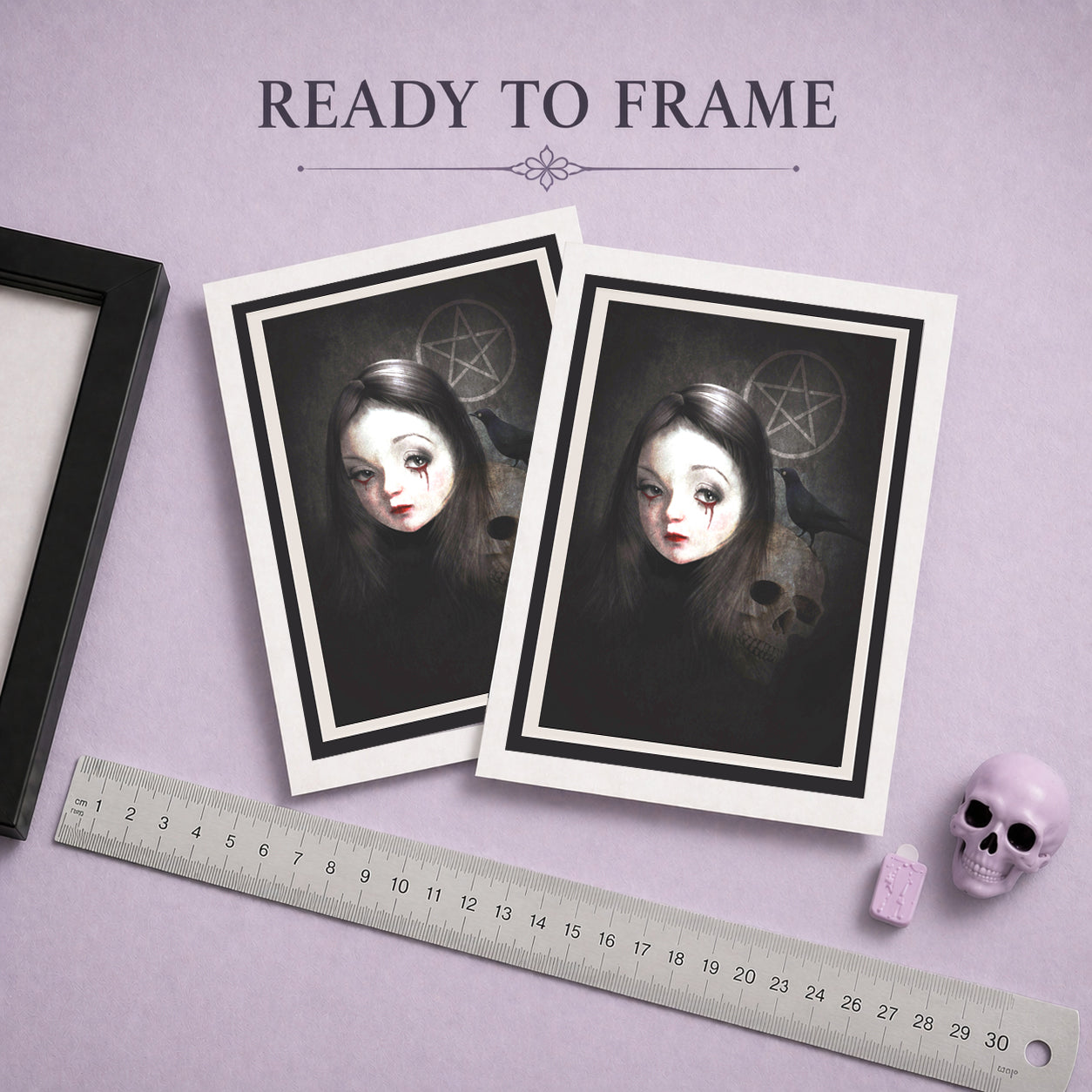 Ready To Frame Occultist dark gothic greeting card with white envelope, featuring a skull, blackbird, weeping girl, and pentacle laid on a lilac background.